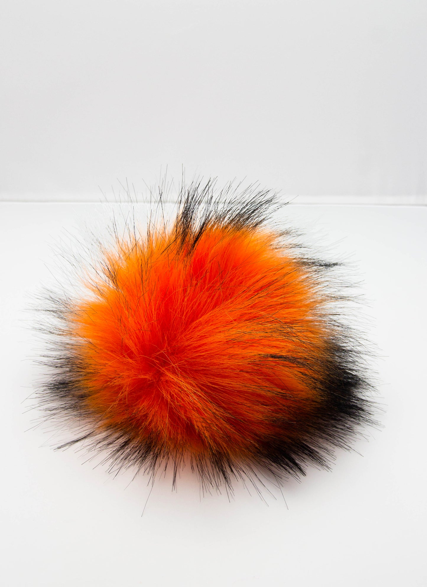 Orange pompom.