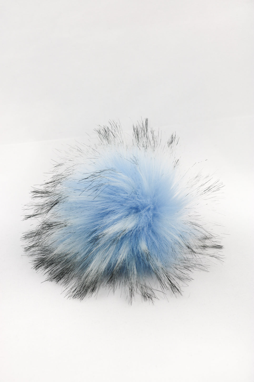 Light blue pompom.