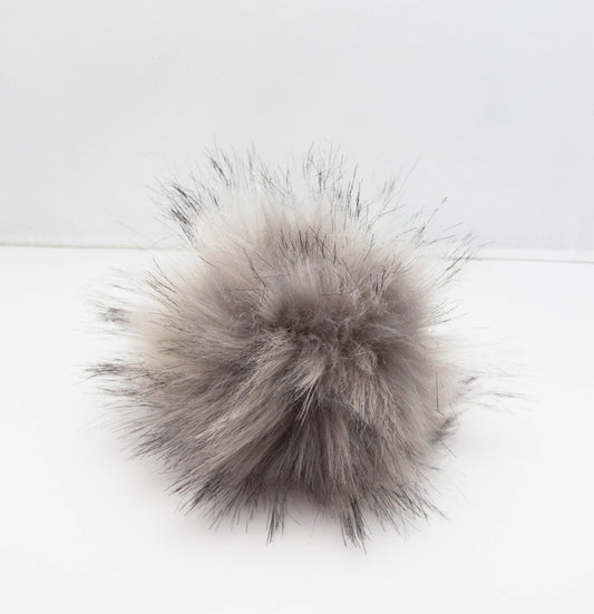 Grey pompom.