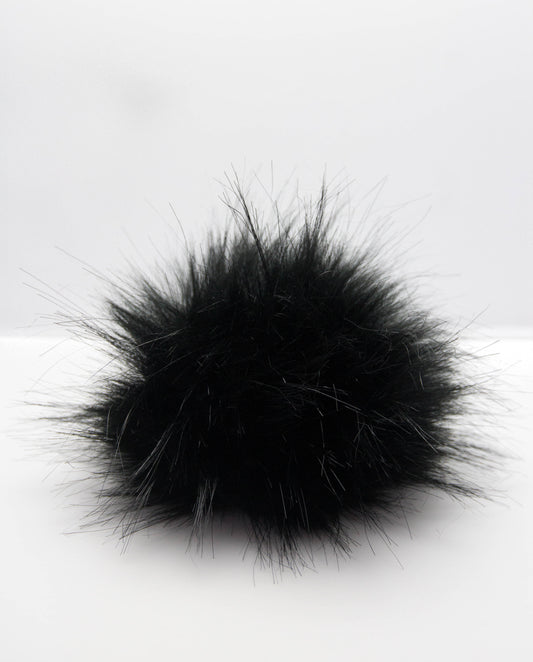 black pompom.